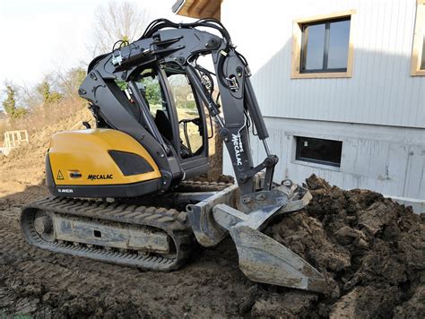 mini excavator skid steer combo